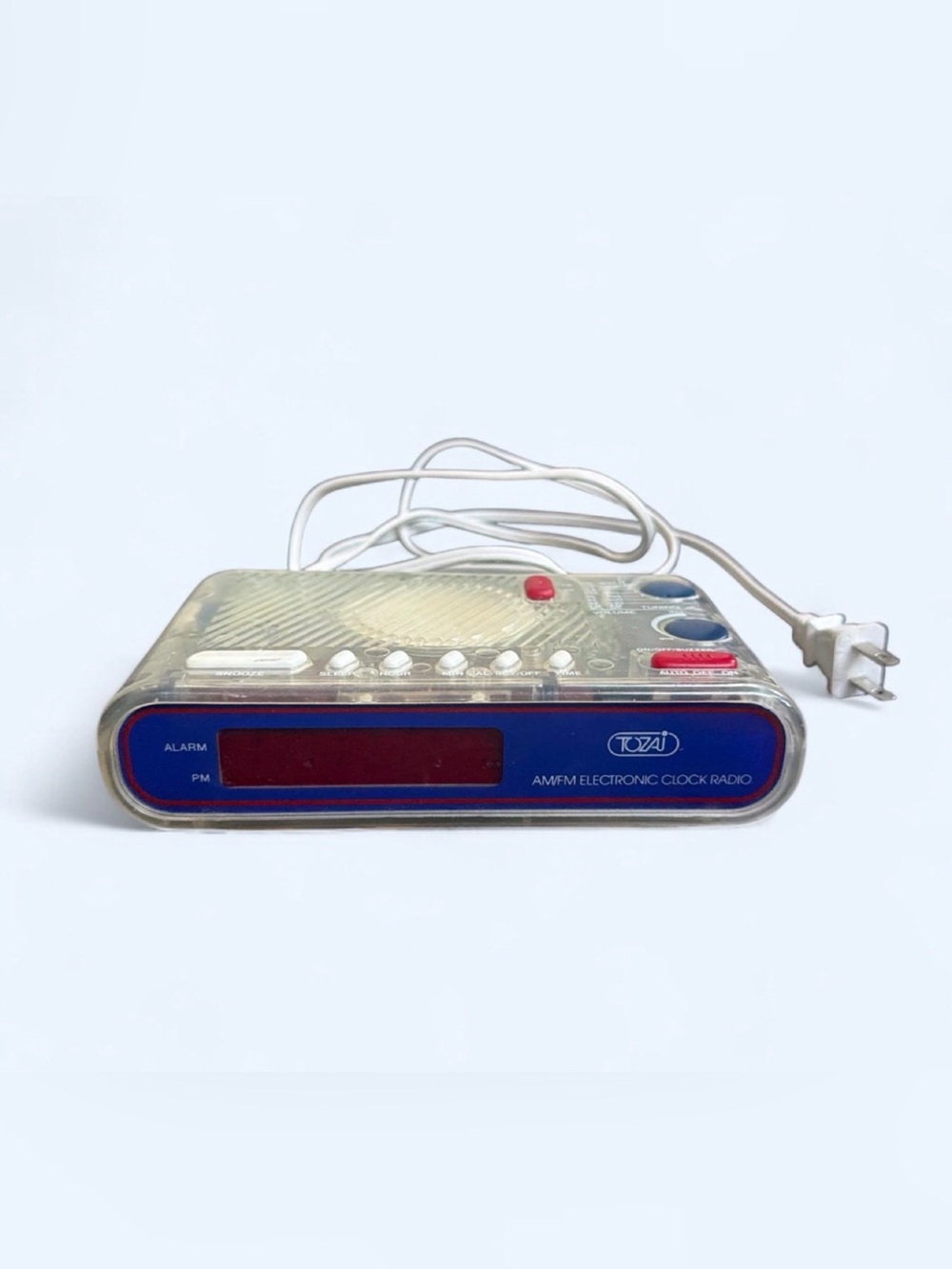 TOZAI electronic clock radio featuring a clear acrylic/plastic case 1970s/1980s